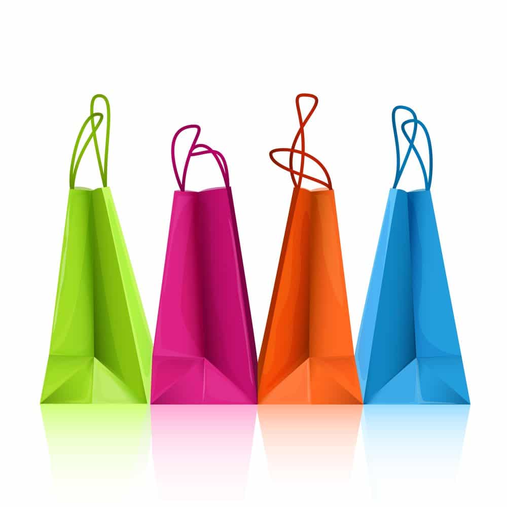 Taming Lifestyle Inflation: How to Live Below Your Means Tame lifestyle inflation and learn how to live below your means. White background with colorful shopping bags.