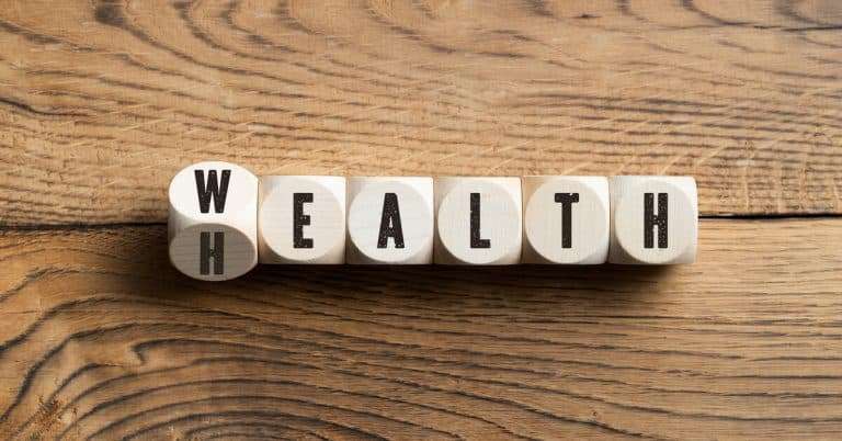 block letters demonstrate the close connection between wealth and health due to the millionaire mindset